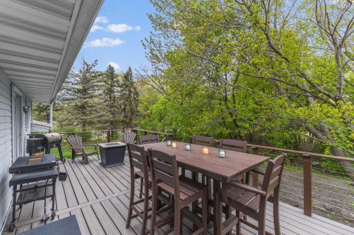 Stunning 24x12 Trex Deck with extra wide stairs and lower level seating area. Great entertaining space!