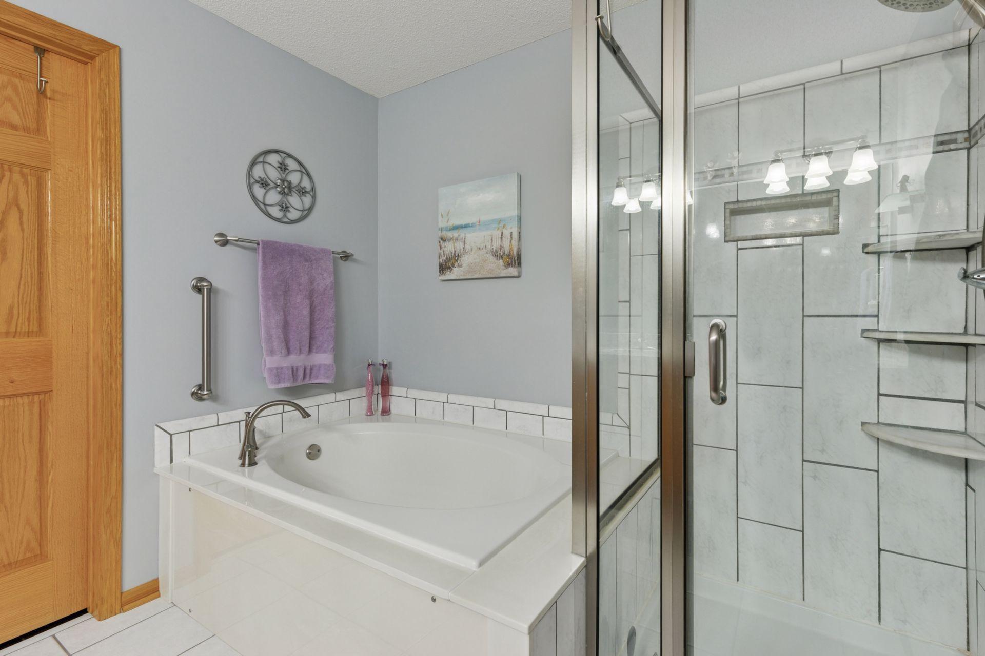 This is a soaking tub and check out the creative tile install.