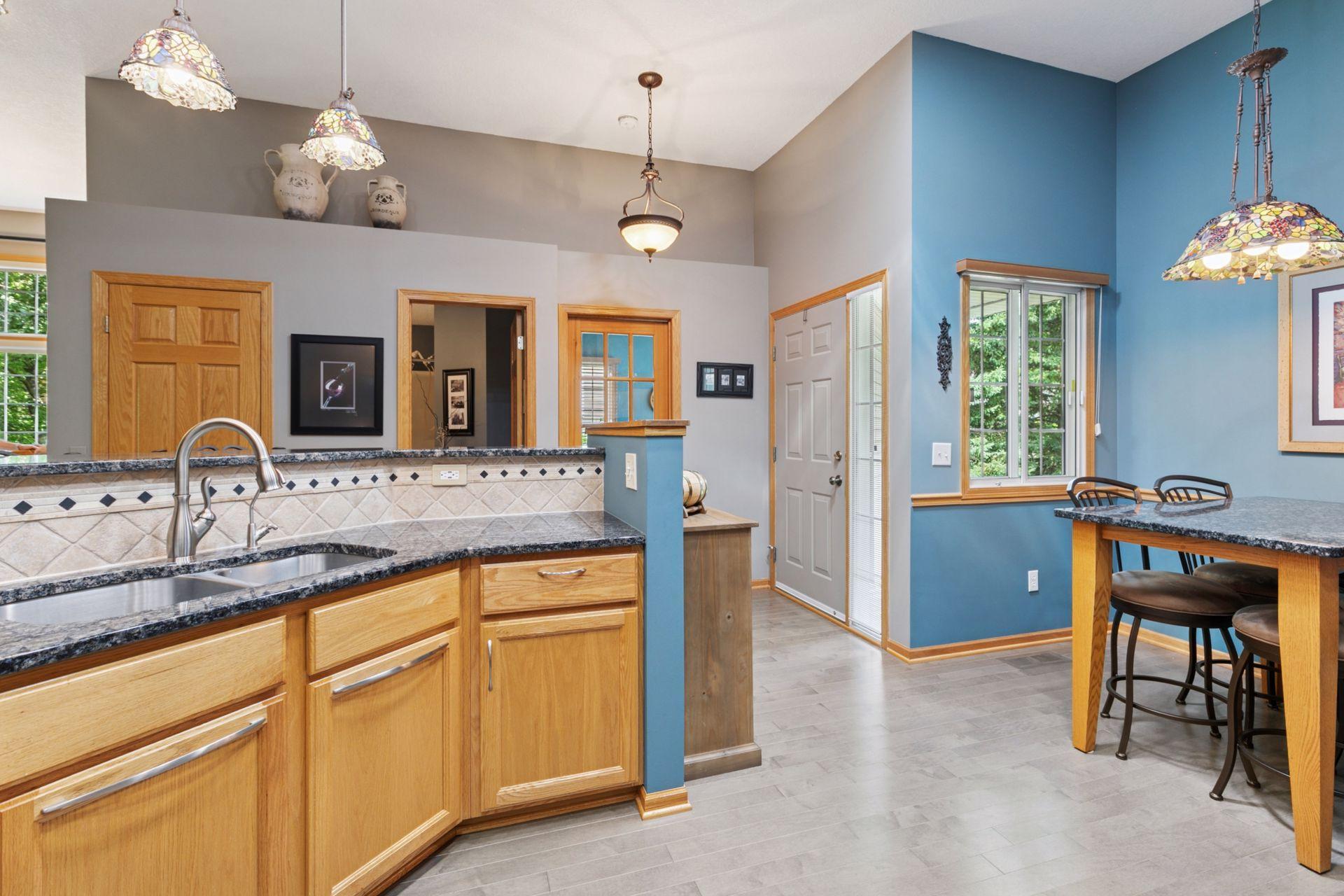 Note the high shelf at the ceiling for display and the three doors: 1. A 12.47' X 10.61' BEDROOM that is used as an OFFICE. 2. A FULL bath. 3. A coat closet. Very convenient for many uses!