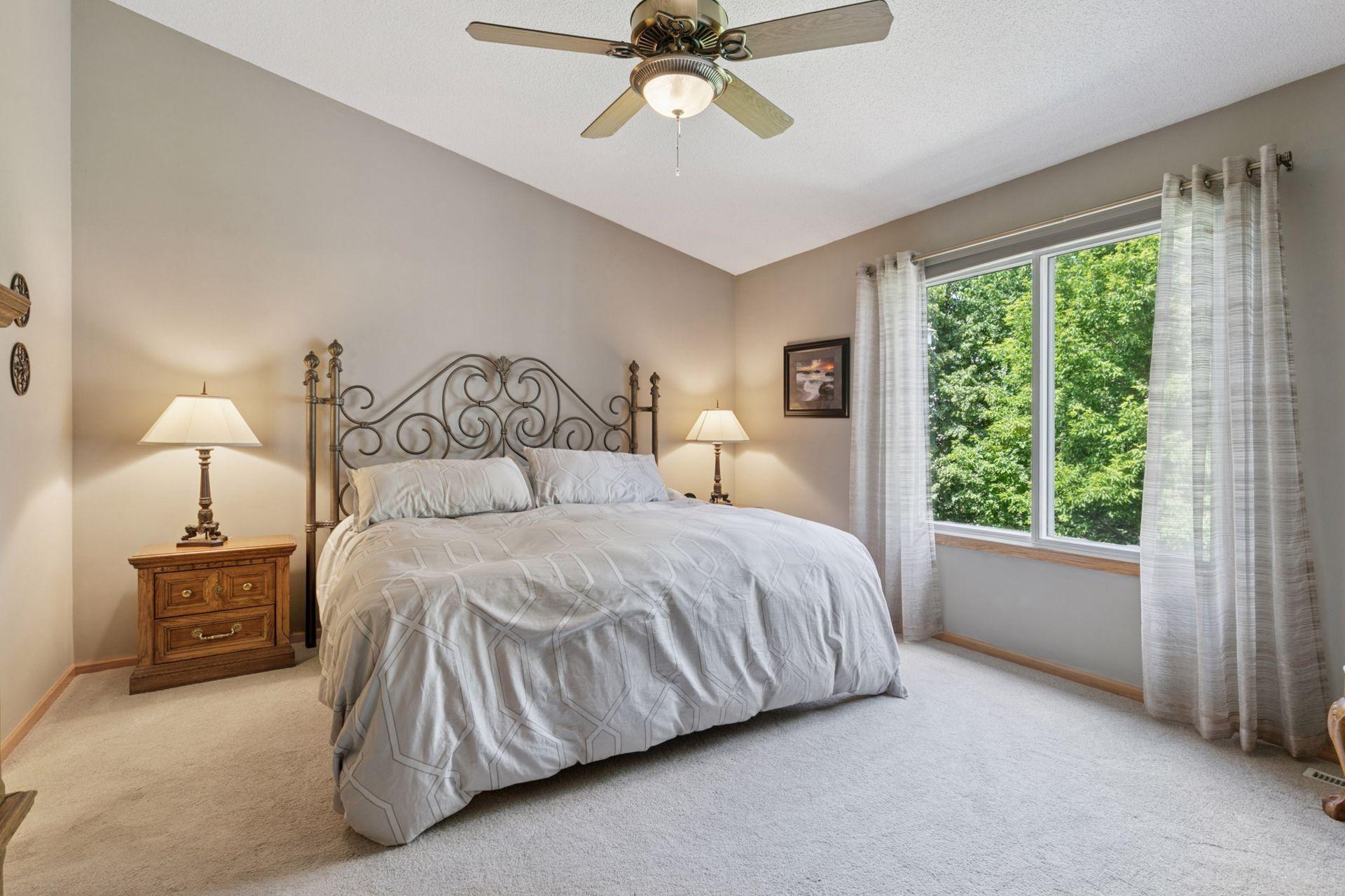 More than enough room for this KING SIZED bed, plush carpet underfoot, soaring ceilings and more beautiful nature views...you will love this luxurious bedroom suite.