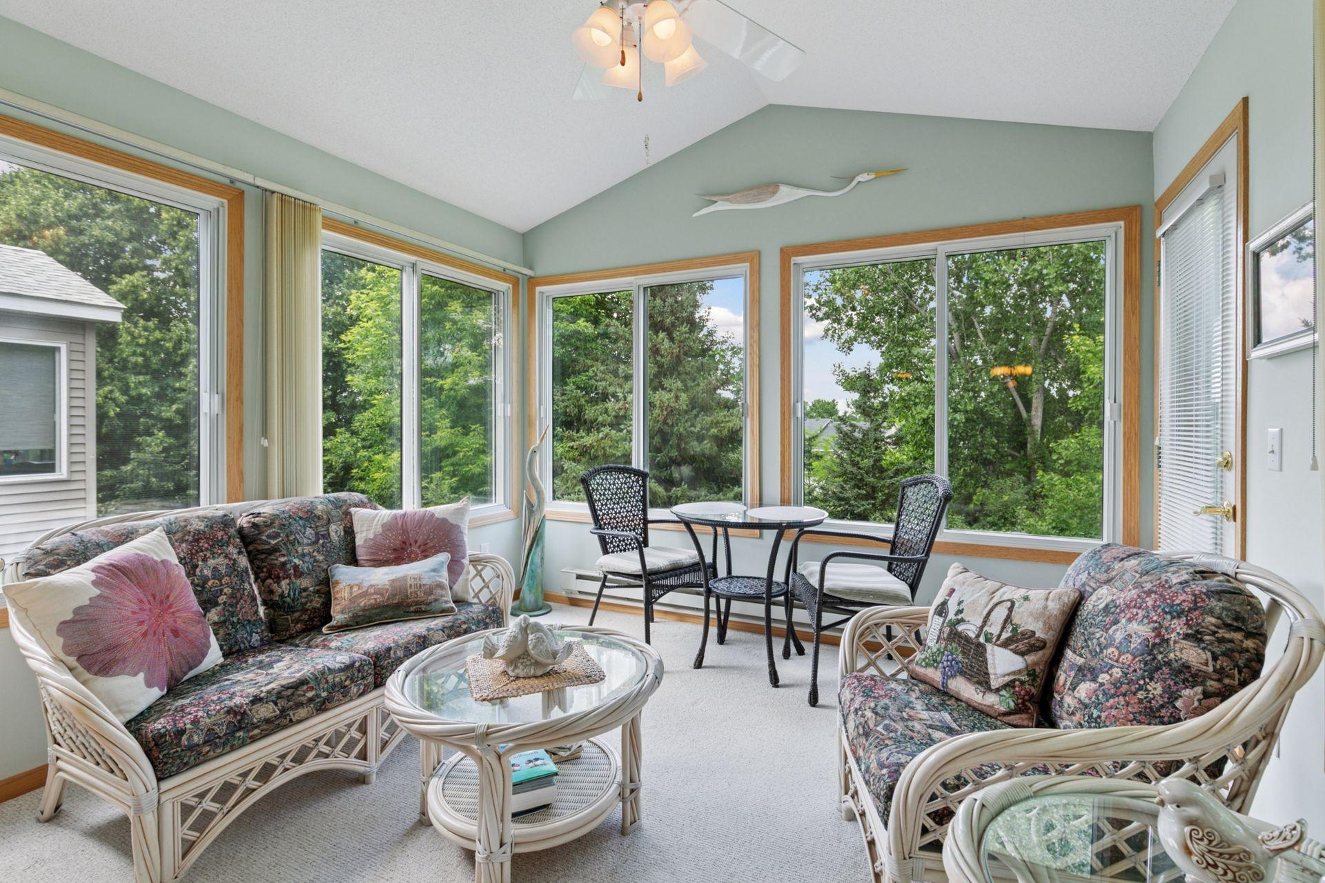 Inside you can see the wall to wall glass, a door to the deck and what a view!