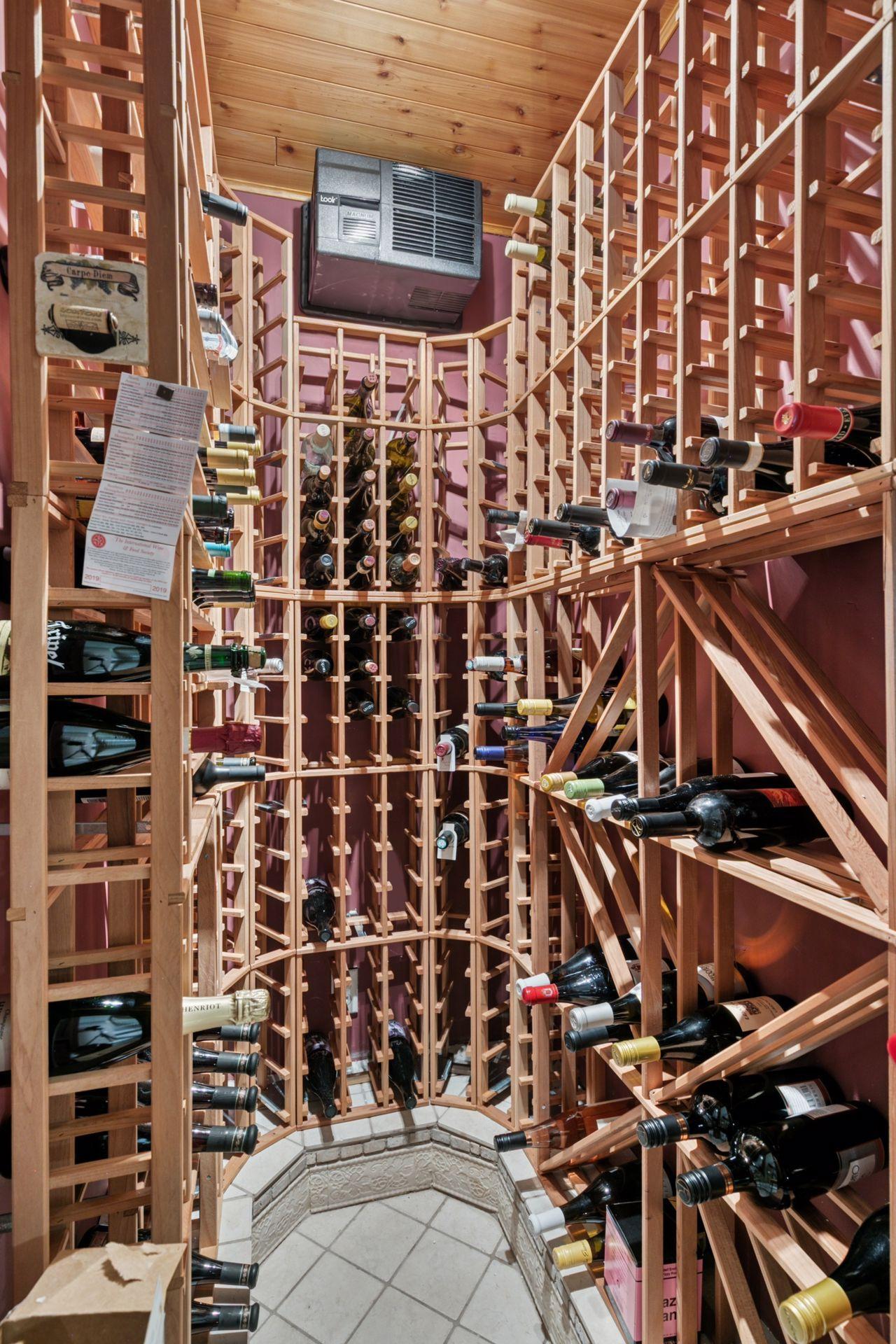 Inside, the wine cellar is temperature/humidity controlled.