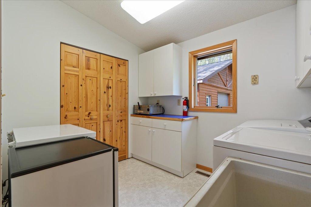 Laundry room with utility sink