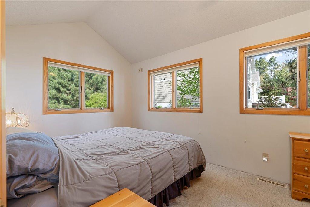 Bedroom 1, with vaulted ceilings