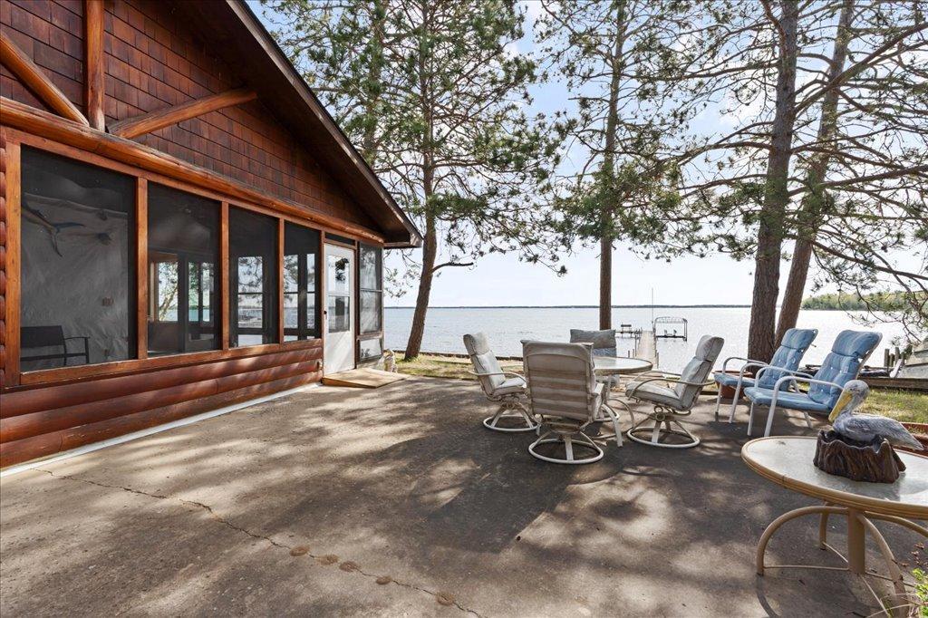 Spacious lakeside patio ideal for outdoor dining and sunrise views.
