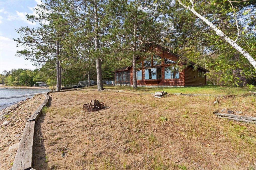 Lakeside cabin grandfathered in at 50 feet back.
