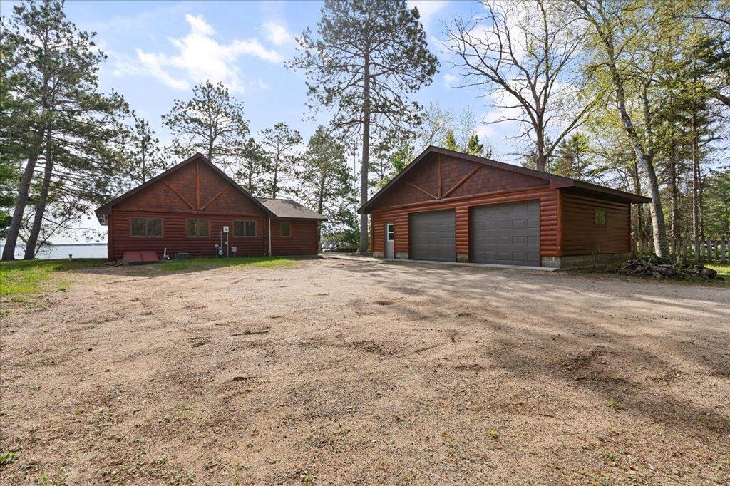Detached garage with ample storage and classic up-north cabin appeal.