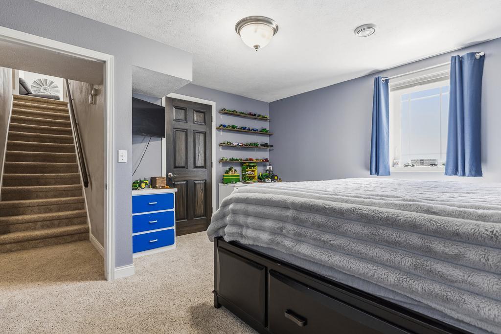 The stairway leads to the main floor living room