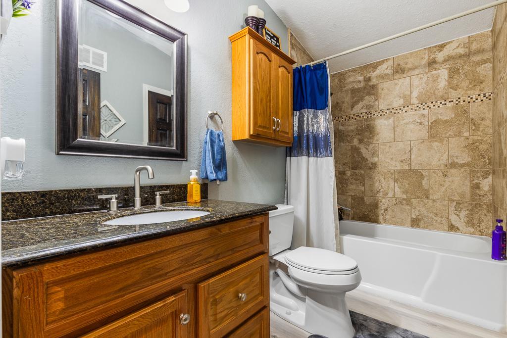 Granite countertop in the main floor bathroom