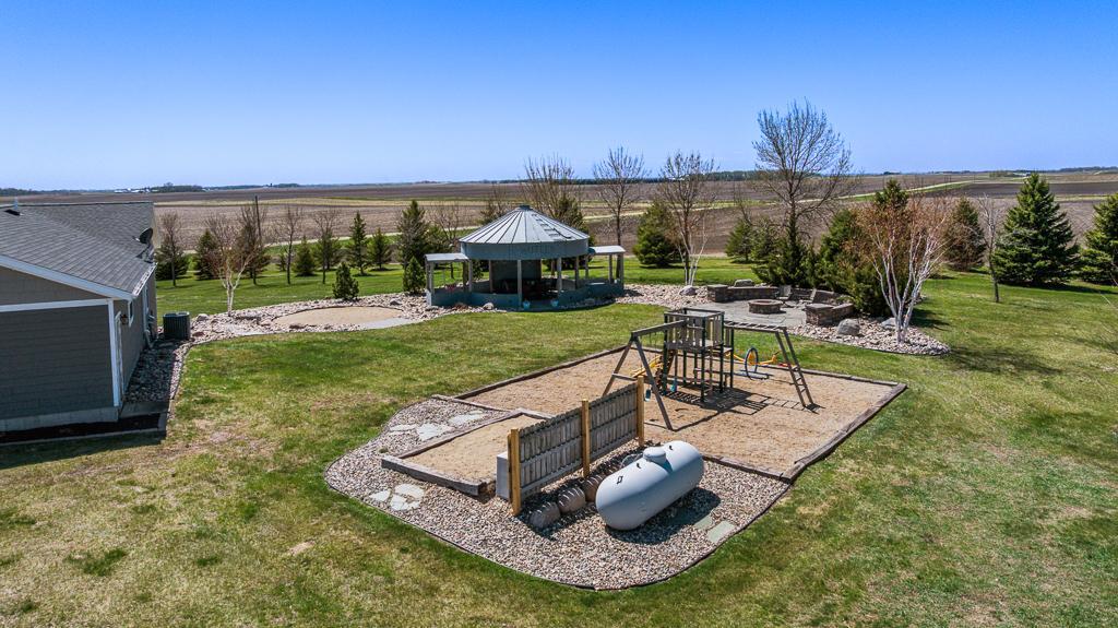 Your backyard oasis awaits! This space is primed to entertain and relax endlessly throughout the summer days