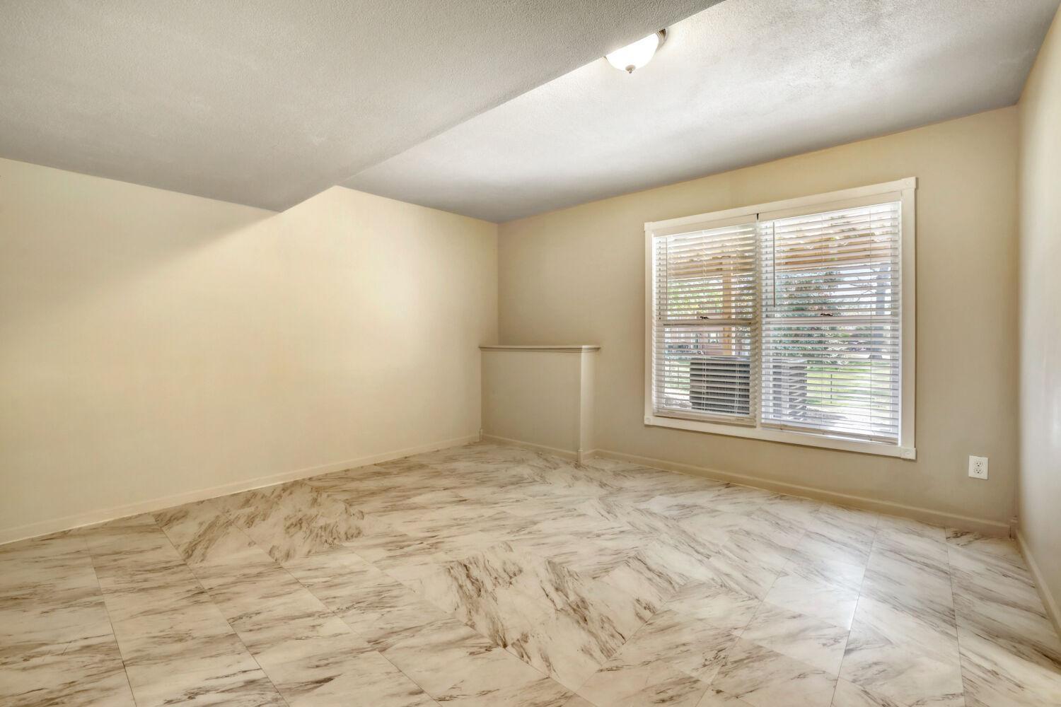 Or you could turn the entire lower level into a rental suite with the simple addition of a range to the wet bar area.