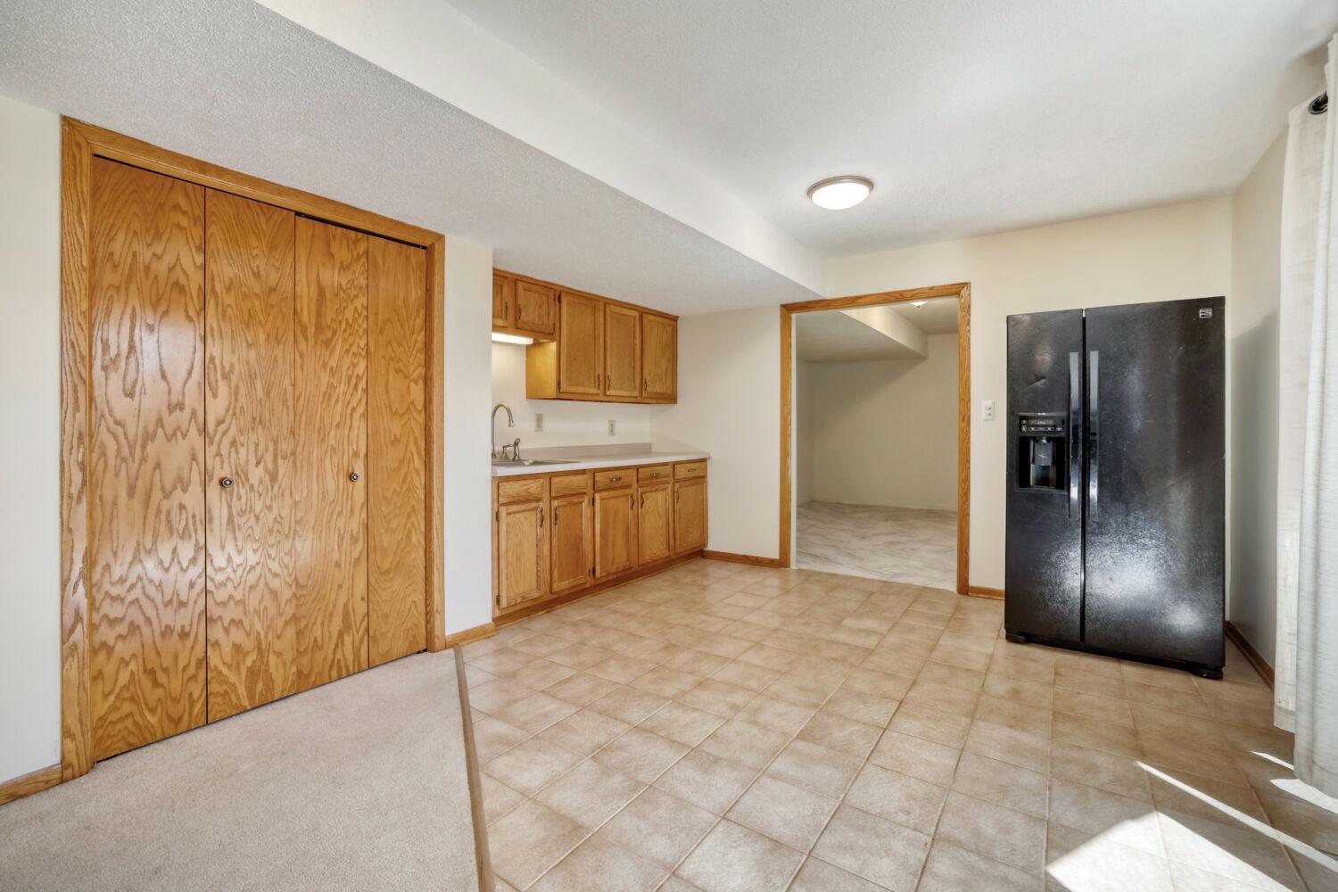 Wet bar in the lower level or one could turn this into a kitchen and have the lower level be a mother-in-law suite.