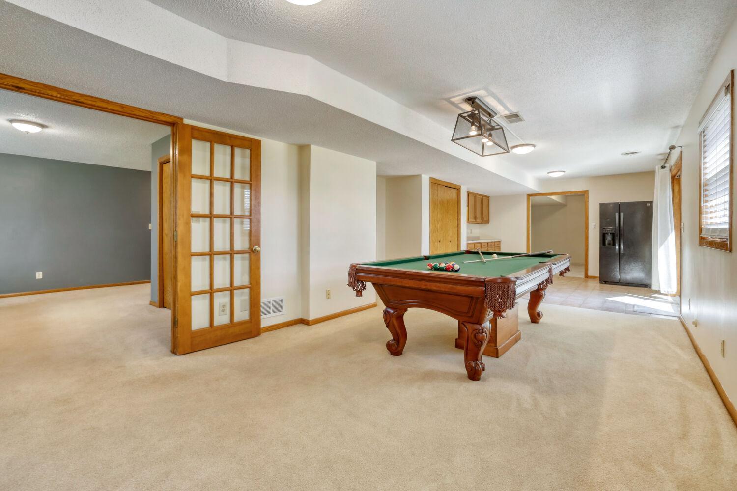 LL amusement room is all ready for you and comes with a pool table!