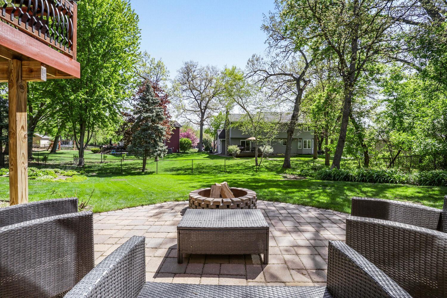The paver patio with a fire pit is ready for you to host your first get-together this summer at your new home!