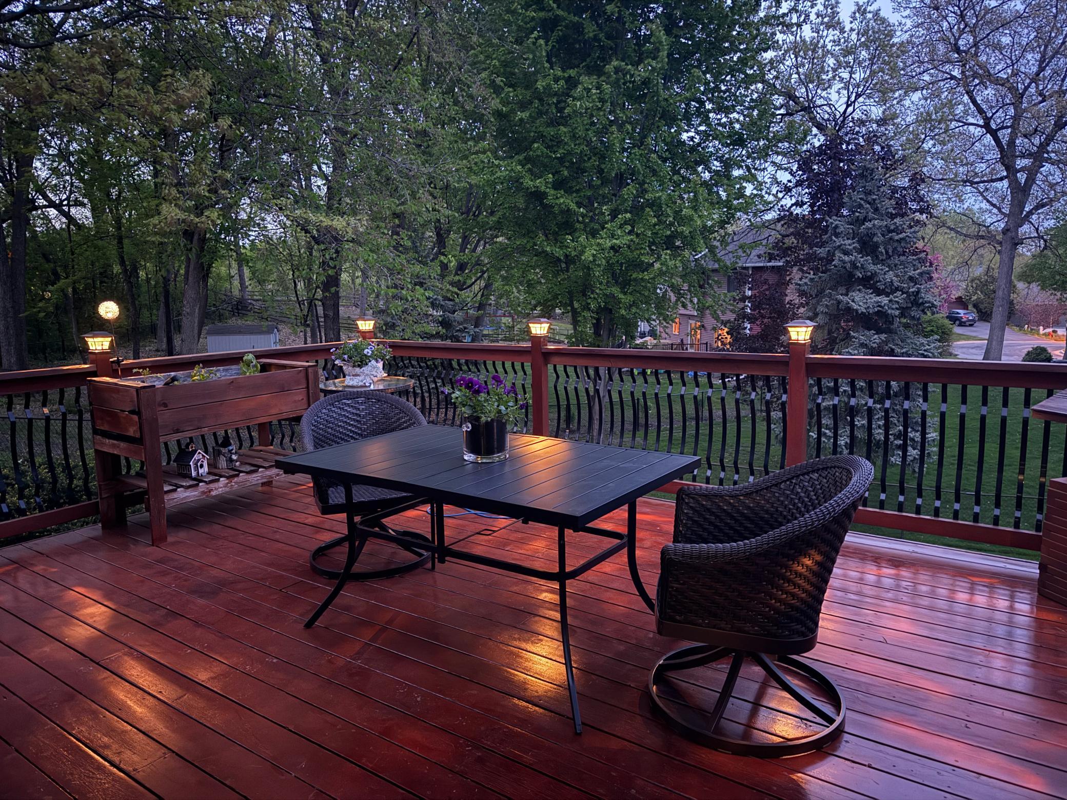 Have a romantic or peaceful evening with the soft glow of the solar light posts illuminating the deck for you.