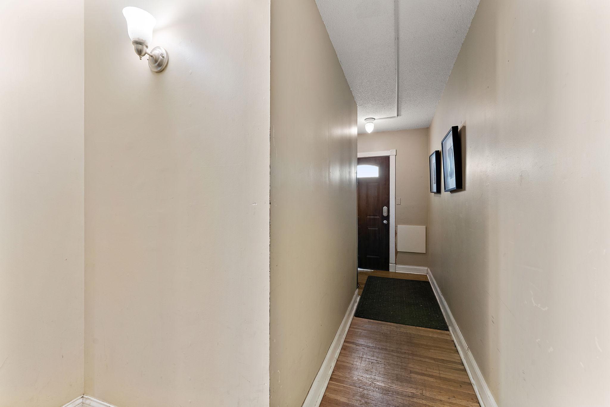 Front foyer entry and to basement