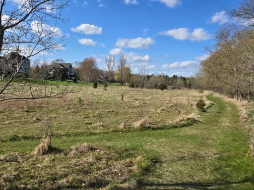 Surrounded by miles of natural trails, sidewalks & asphalts paths