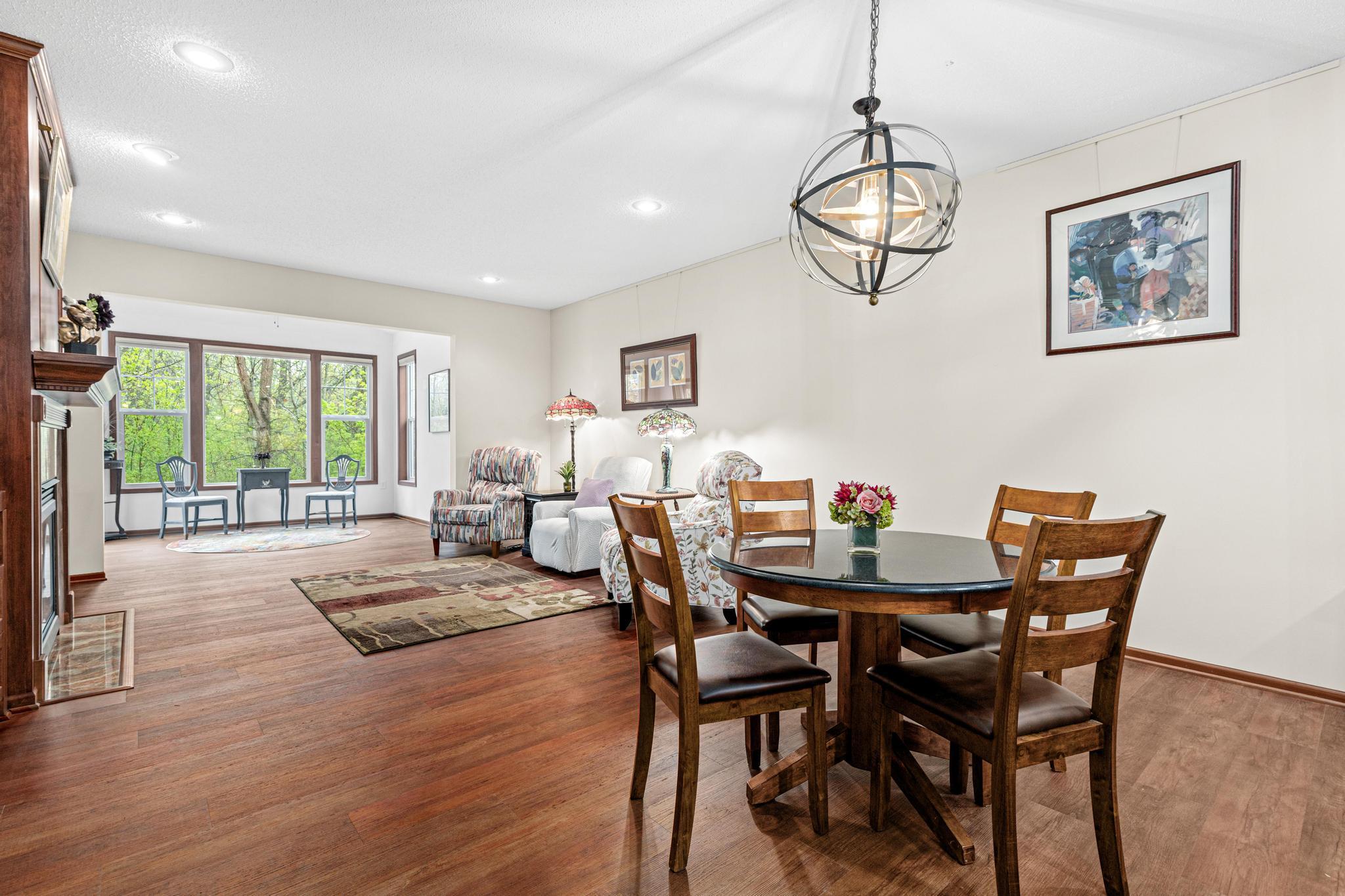 Luxury vinyl plank flooring provides durability while supporting a seamless flow throughout much of this level.