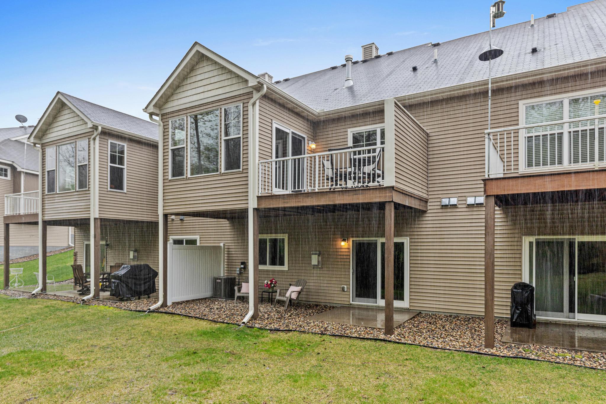 Multiple outdoor areas and plenty of windows to show off the wooded views add to the comfortable lifestyle here.