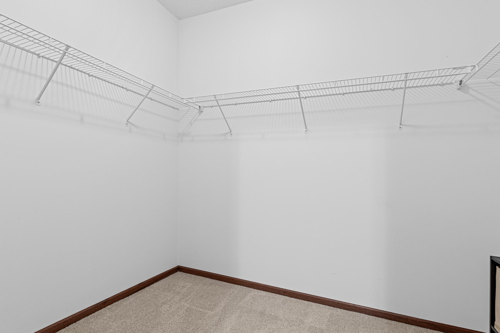 Storage is in abundance with a generous walk-in closet, under stairs storage plus additional space in the utility room on this level.