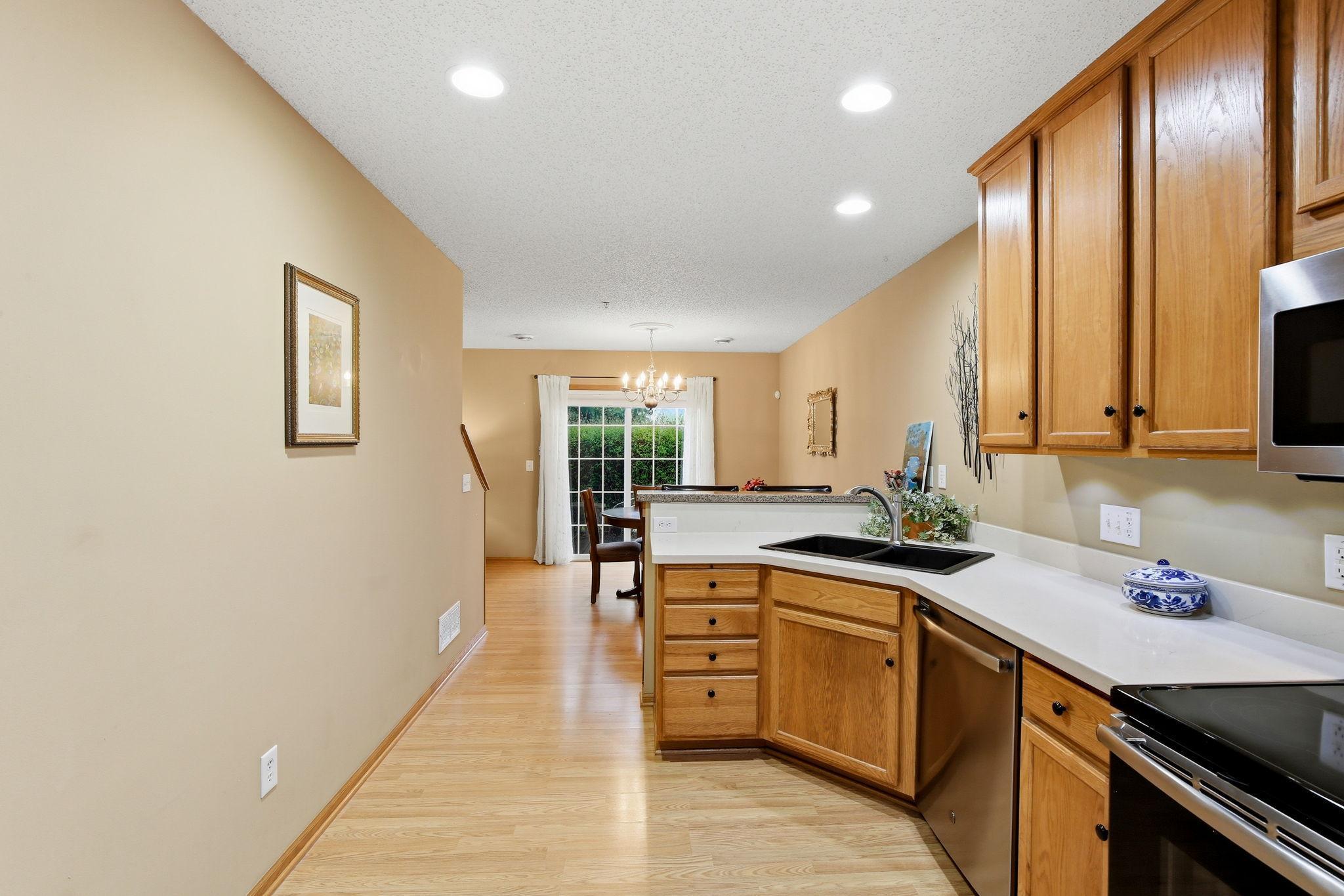 Not pictured is a pantry, offering additional storage and added convenience in the kitchen. Stainless steel appliances are all included.