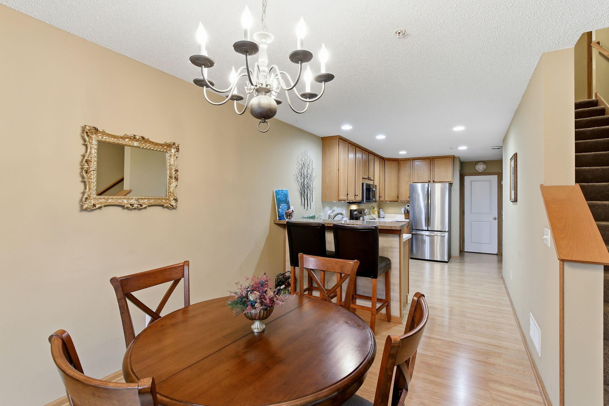 The dining room and kitchen offer a nice, open flow, creating a seamless space that’s ideal for everyday living.