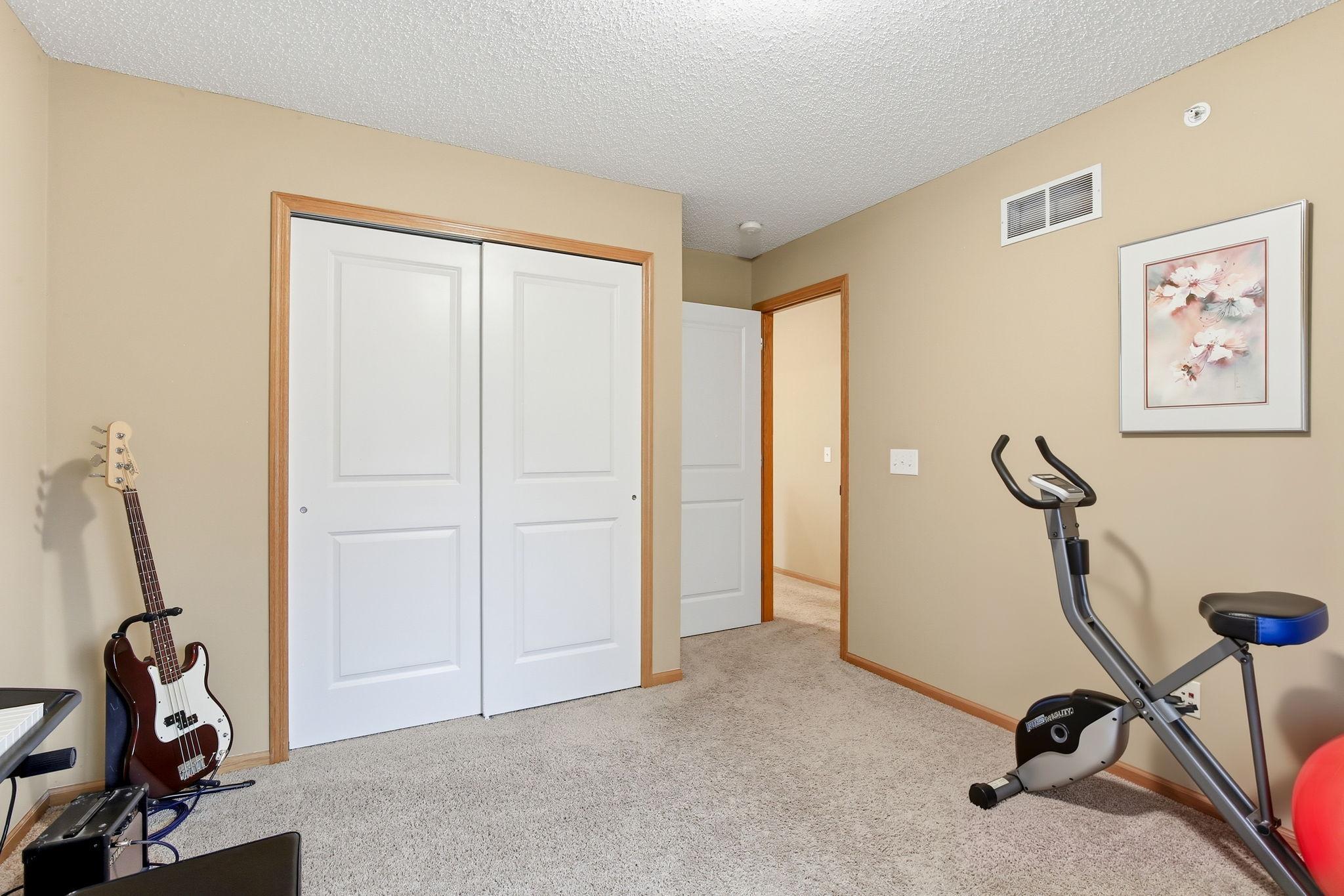 The second bedroom also features closet organizers, providing convenient, efficient storage.