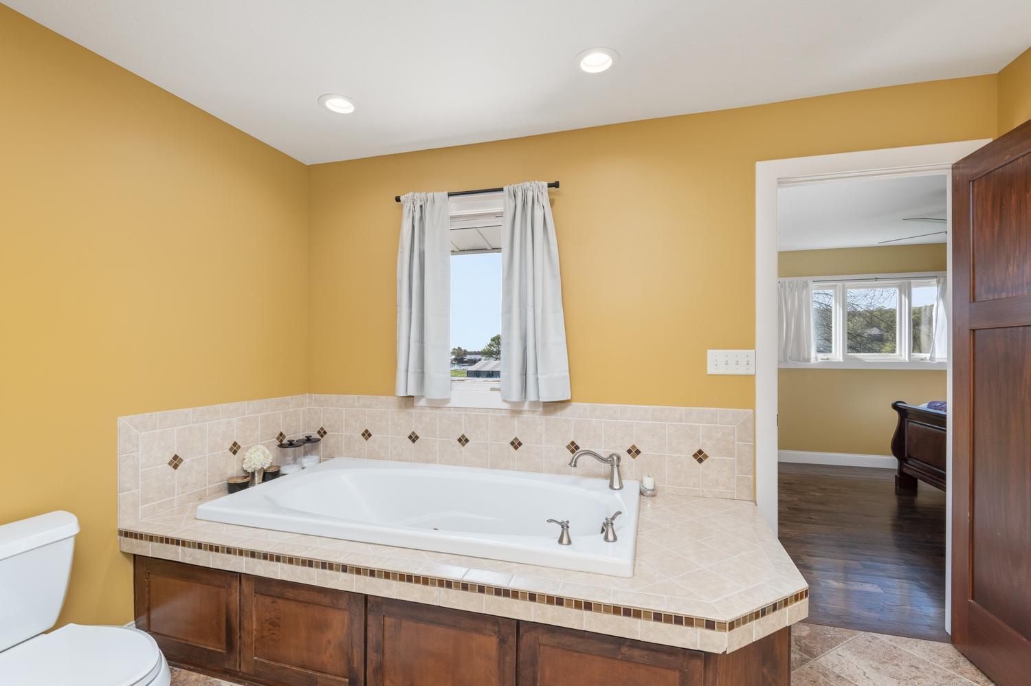 Whirlpool tub in the primary bath.
