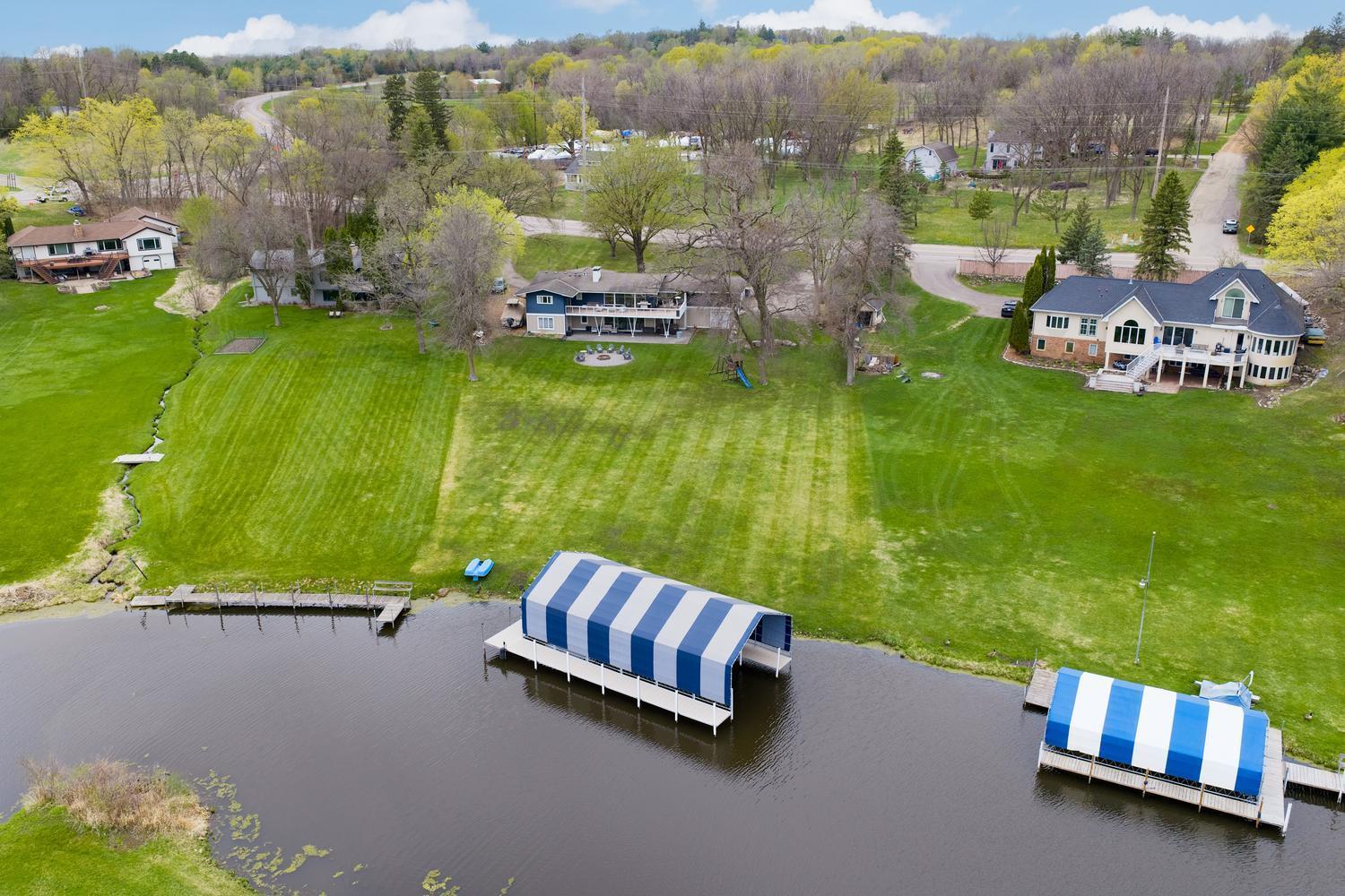 Large, level one acre lot and a 48 foot slip with shore power on Lake Minnetonka.
