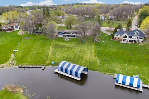 Large, level one acre lot and a 48 foot slip with shore power on Lake Minnetonka.