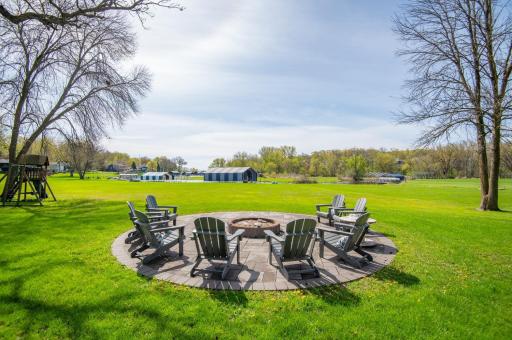 Imagine entertaining good friends and family at the fire pit this summer! It is an easy walk to the 48 foot dock slip and boat!