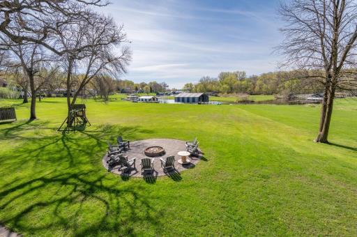 Entertain friends and family at the circular patio, firepit and fantastic lawn. It is an easy walk to the dock on this level lot.