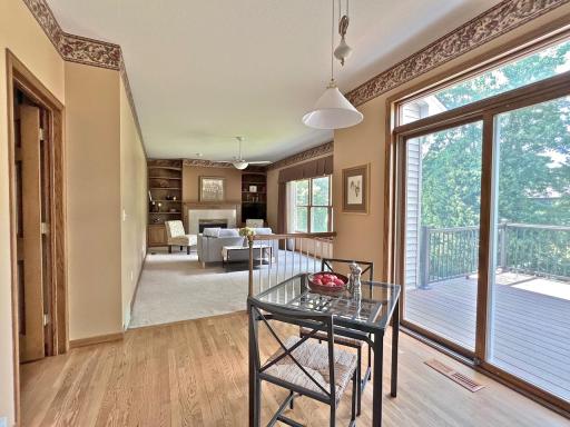 Kitchen and informal dining area open to family room