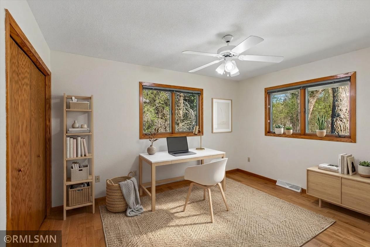 2nd bedroom on the main level - this photo has been virtually staged