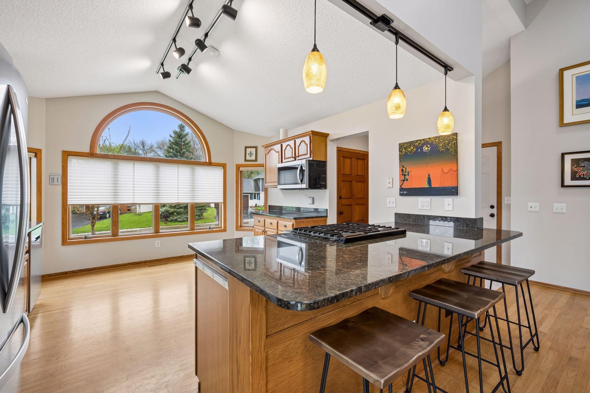 Kitchen view into front yard