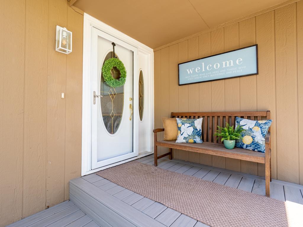 New deck with a covered front entry.