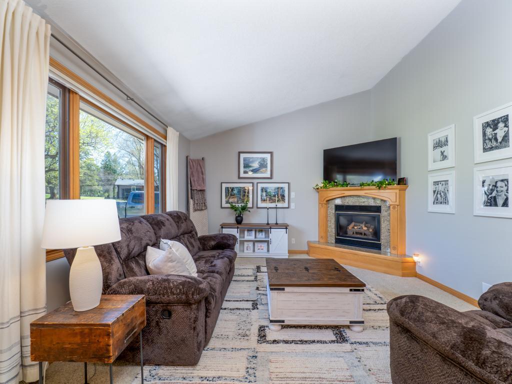 Soaring vaults & gas fireplace in the living room.