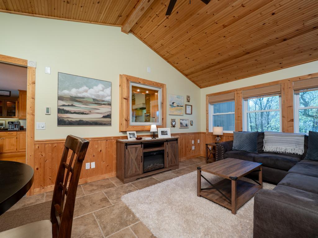 Kitchen window looks into the sun room.