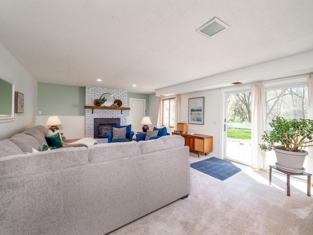 Lower level family room with walk to backyard.