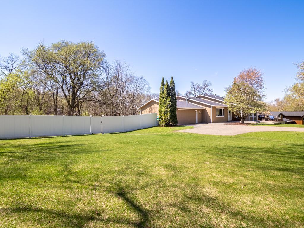 Newer vinyl privacy fence.