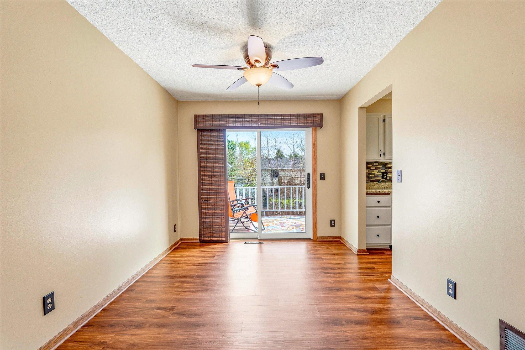 Dining area with sliding glass door access to the deck, creating the perfect setup for indoor and outdoor entertaining.