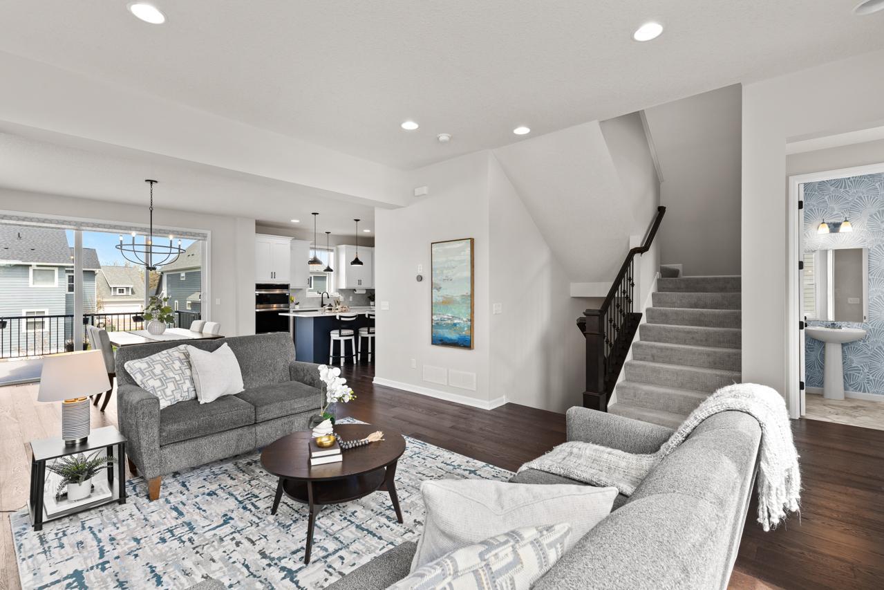 Seamless flow between kitchen, dining, and living spaces
