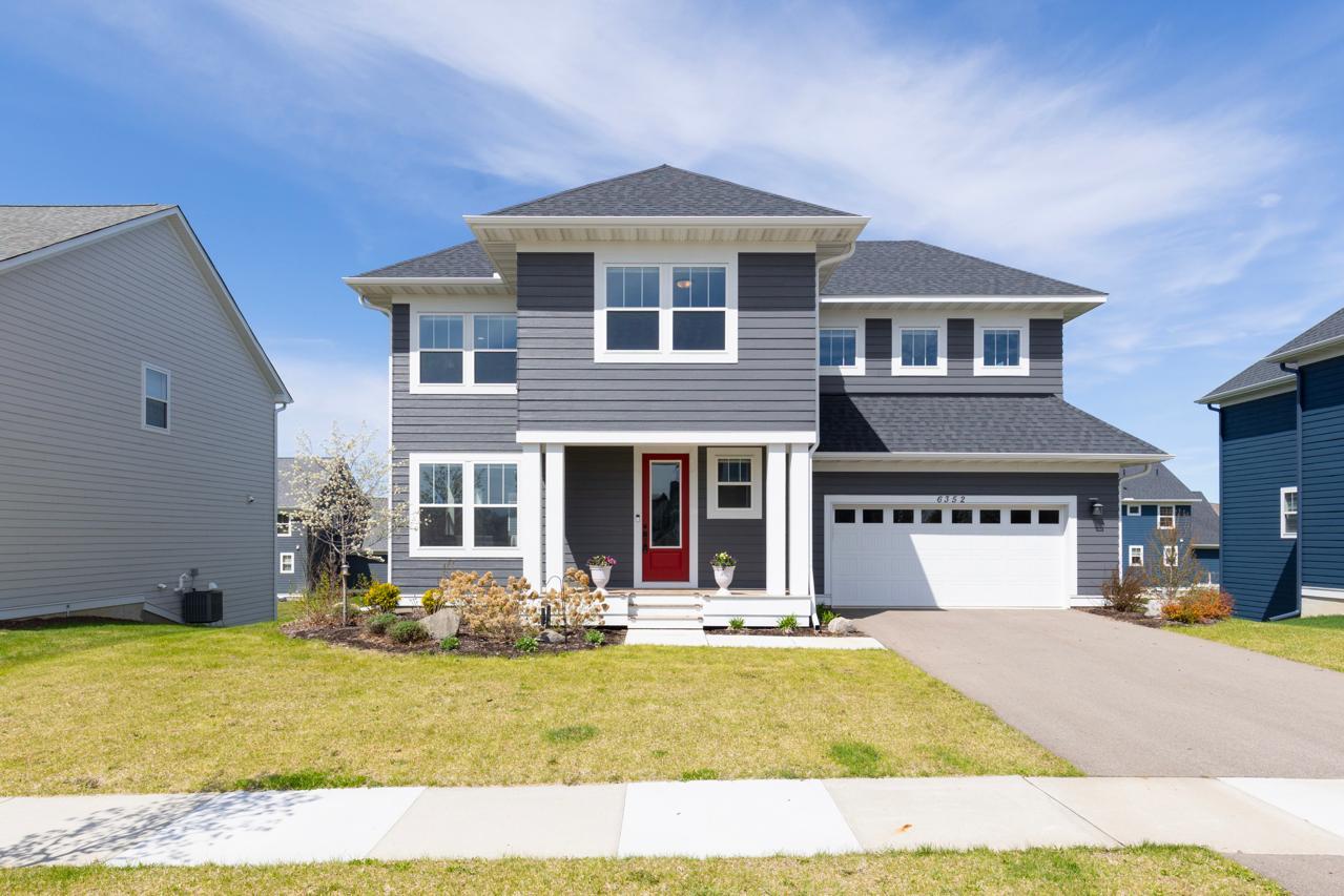 Built in 2023 by Robert Thomas Homes with designer window treatments throughout