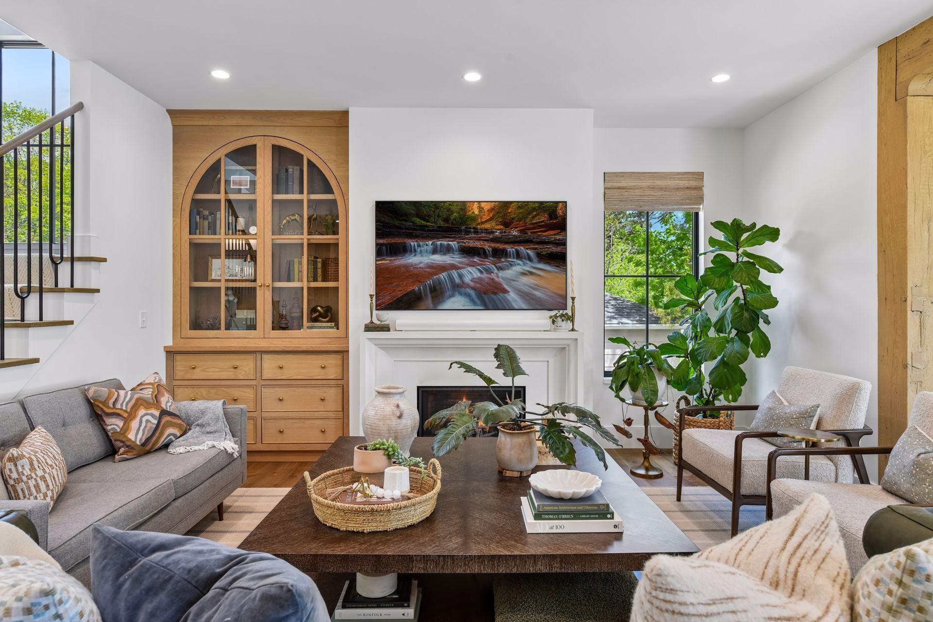 Main floor family room is spacious and comfortable. The room is filled with natural light. Lovely built-in. Flooring is high quality engineered hardwood which can be sanded if necessary. Withstands MN climate changes.