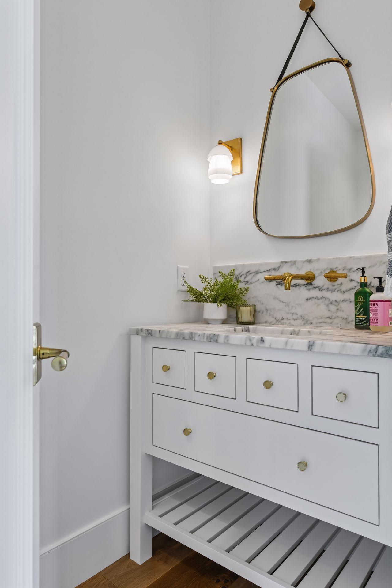 Every detail was thought out to create beautiful and unique spaces like this powder room.