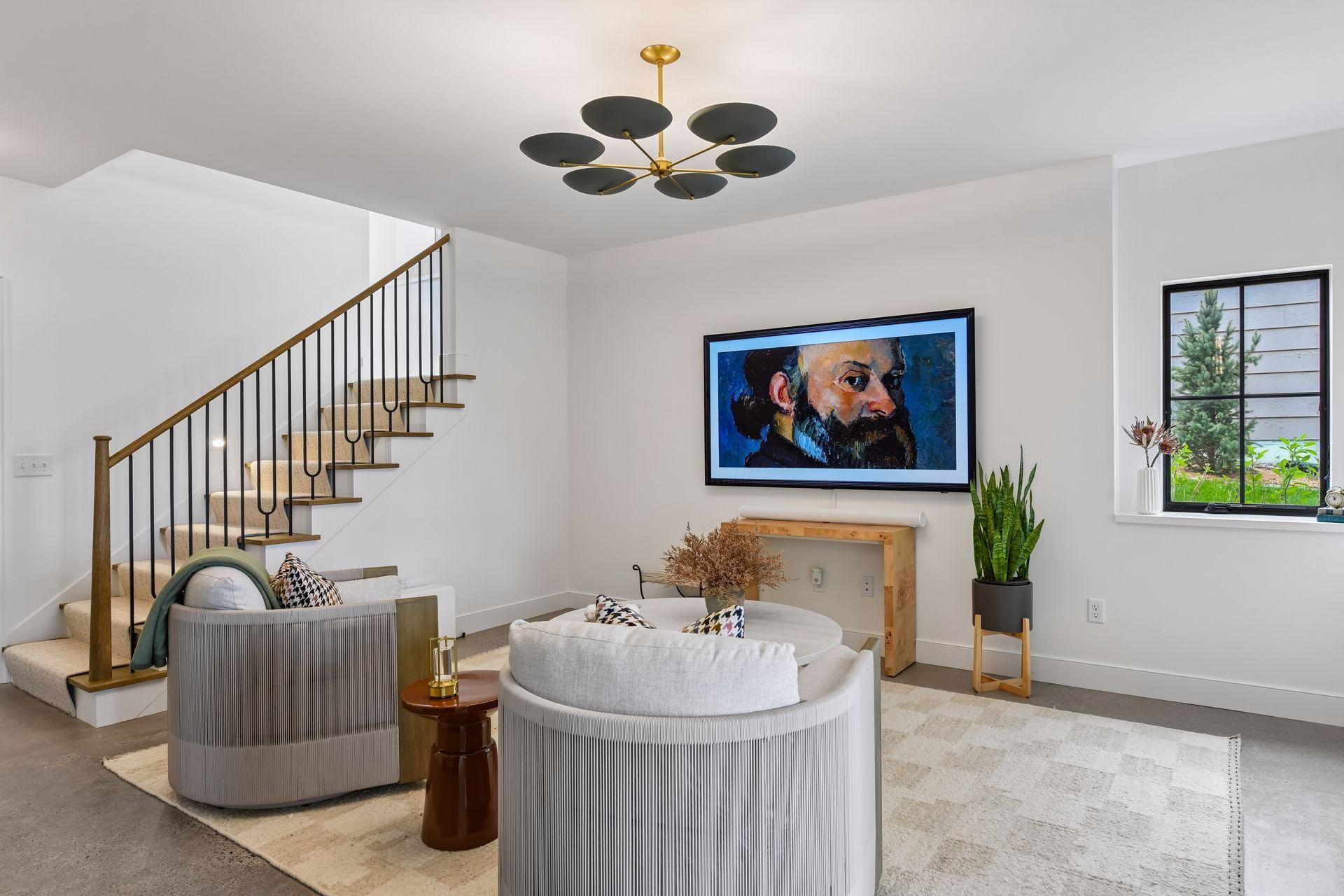 Add a cabinet to the left of the TV, a console under the TV and a banquette with storage under the window. Plans and selections are available to finish this space.