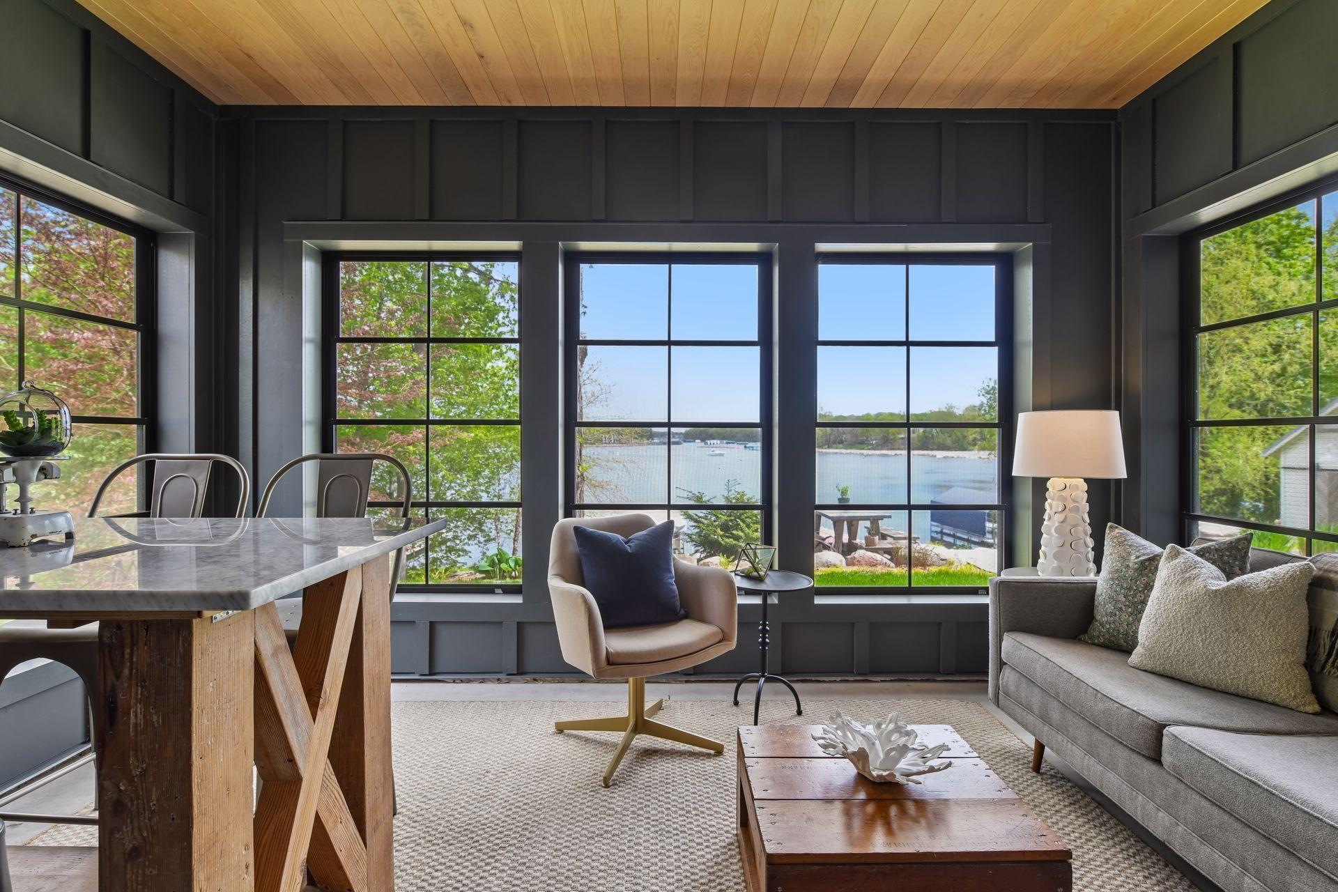 Lower-level 3-season porch is the perfect spot to sit and enjoy lake breezes and relaxing views, without the company of mosquitoes. EZ screen windows keep out wind and rain, but also open when you want the fresh air. Gas line ready to add stove.