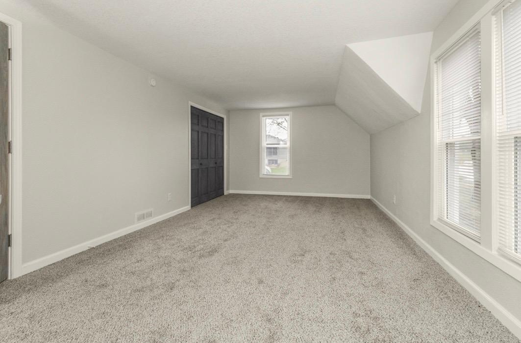 Upstairs primary with two closets