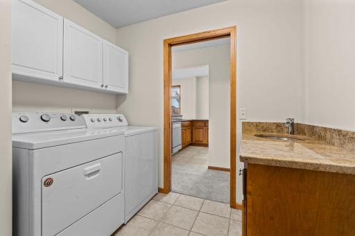 All living facilities on the main level with laundry on the main. Built-in cabinetry and granite countertops.