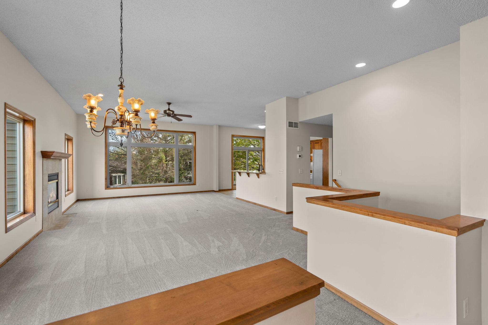 Spacious main level with informal dining, living room, a ton of windows and a cozy, gas fireplace.